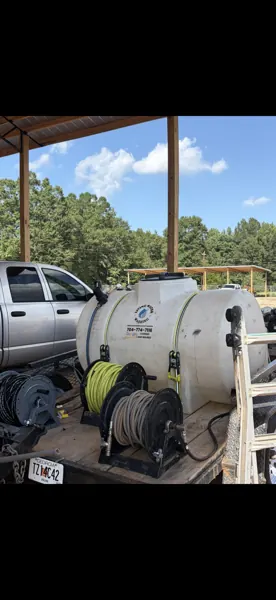 Pressure washing equipment and water tank on the work trailer